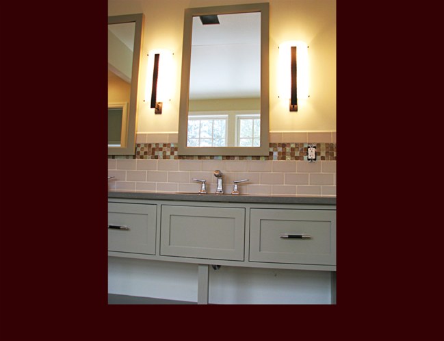 Bathroom vanity with framed mirrors to match.