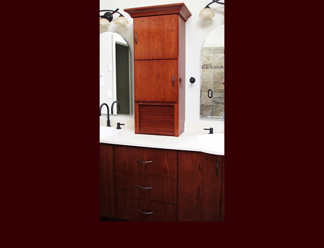 Cherry Master Bath Vanity. Contemporary Slab Fronts. Center drawer cabinet.
