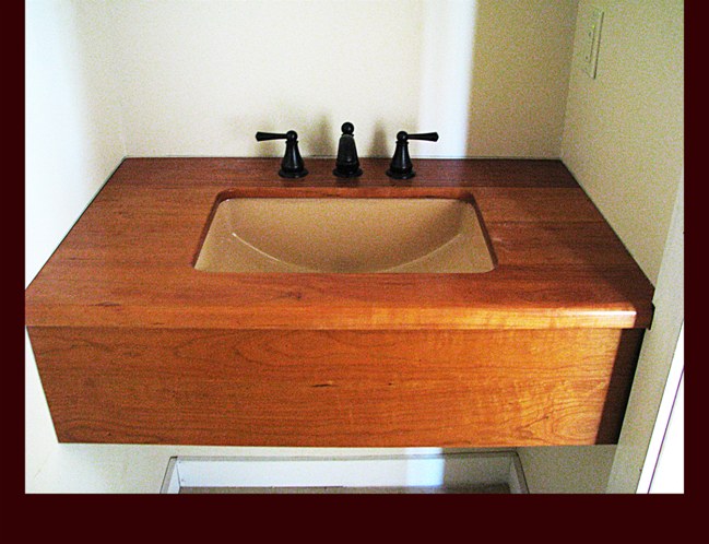 Cherry Skirt and Wooden Top Bath Sink cabinet. Marine Spar Varnish Finish.