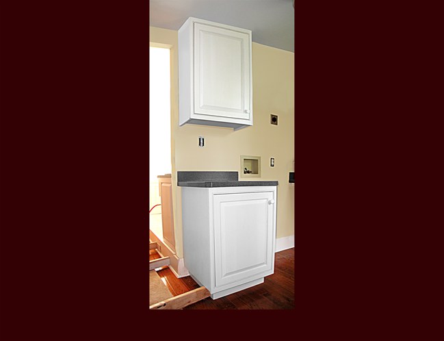 Laundry Room Utility Cabinet. White Painted Raised Panel Overlay door style.