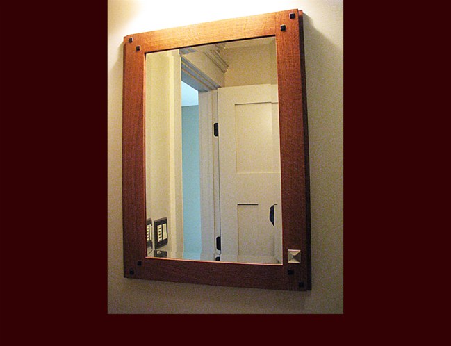 White Oak Stained Medicine Cabinet. Beveled Mirror Glass. Ebony inlays in frame.