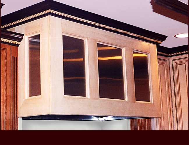 Custom Maple Hood with Stainless Steel Panels. Crown Moulding with rope detail.