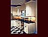 White Lacquer Maple Kitchen Cabinets. Raised Panel door style. Decorative end panels. Crown Molding. 9' ceiling height.